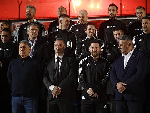 Argentine star Lionel Messi (2nd from right) and Argentine Football Association President Claudio Tapia (right) pose for a picture before Rodriguez's farewell match at the Marcelo Bielsa stadium in Rosario, Argentina on Saturday.