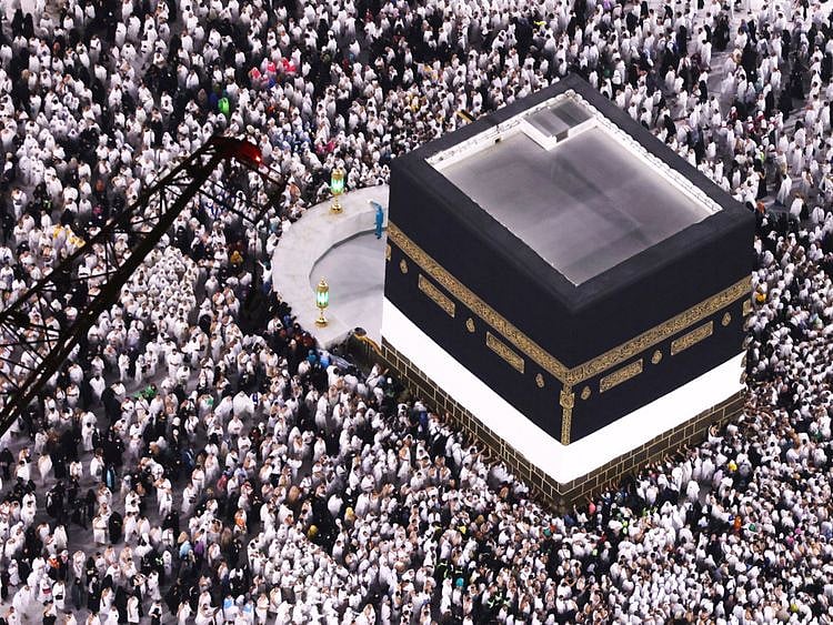 Pilgrims perform the Umrah at the Holy Kaaba.