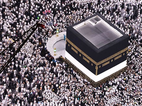 Pilgrims perform the Umrah at the Holy Kaaba.