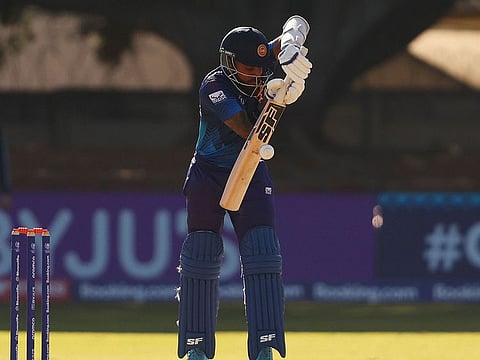 Pethum Nissanka of Sri Lanka plays a defensive shot during the ICC Cricket World Cup Qualifier against Scotland at Queen’s Sports Club in Bulawayo, Zimbabwe, on Tuesday.