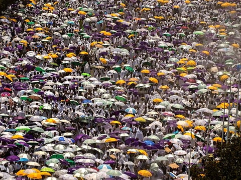 Muslim pilgrims leave prayers outside Namira Mosque in Arafat on the second day of the annual Hajj pilgrimage near the holy city of Mecca, Saudi Arabia, Tuesday, June 27, 2023. 