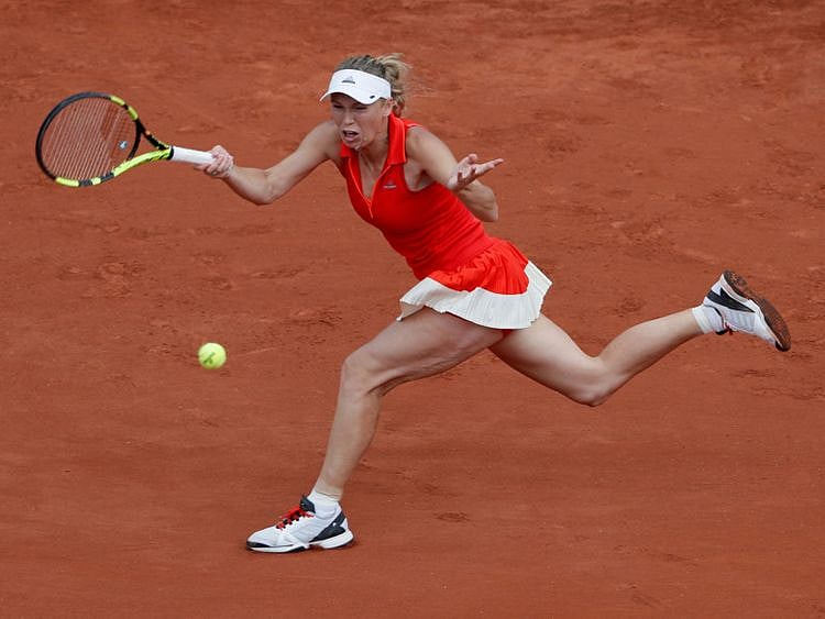 Copy of 2023-06-29T130646Z_660313447_RC20T1A4SS1V_RTRMADP_3_TENNIS-WOZNIACKI-1688044844831