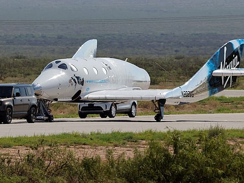 Virgin Galactic's passenger rocket plane VSS Unity is towed to the hangar after billionaire entrepreneur Richard Branson and his crew, reached the edge of space, at Spaceport America near Truth or Consequences, New Mexico, US, July 11, 2021. 