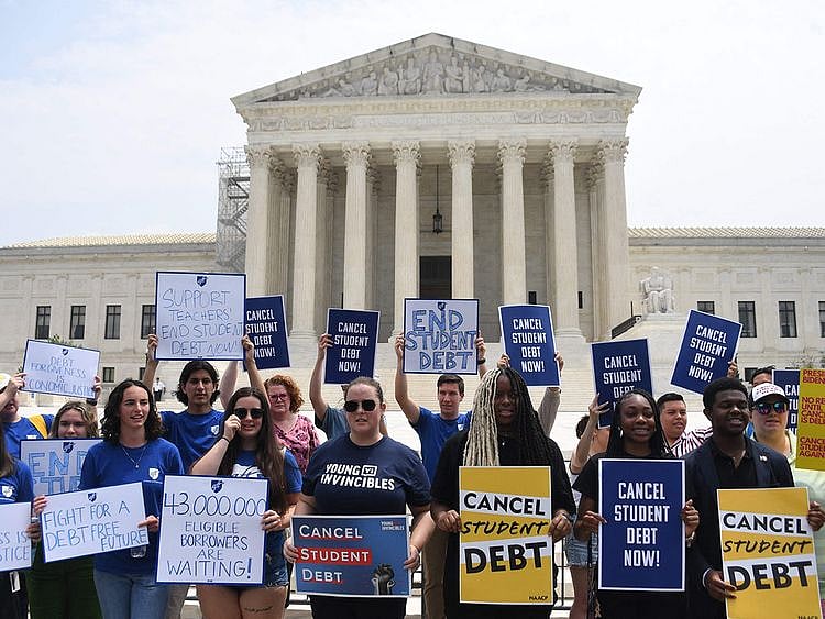 Supporters of student debt forgiveness demonstrate outside the US Supreme Court on June 30, 2023, in Washington, DC.  