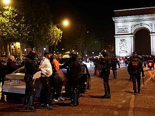 Hundreds arrested on fifth night of France unrest after teen laid to rest
