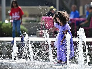 In pictures: Heatwaves and extreme weather wreak havoc around the world