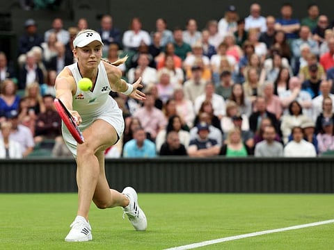 Kazakhstan's Elena Rybakina returns the ball to USA's Shelby Rogers during their women's singles match on the second day of Wimbledon Championships at The All England Tennis Club on Tuesday.