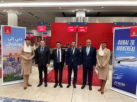 Adnan Kazim, Chief Commercial Officer (3rd left); Salem Obaidalla, Senior Vice President of Commercial Operations, Americas (second right); David Broz, Vice President Aeropolitical and Industry Affairs (second left); Radha Krishna Panday, Ambassador of Canada to the UAE during a ceremony of inaugural flight from Dubai to Montreal.