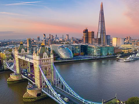 Unusually wet weather in July hurt output at retailers and in the construction sector.