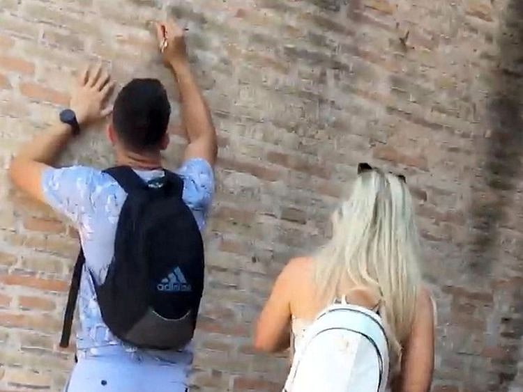 2023-06-27T100729Z_1235150271_RC2LR1AZJRZ0_RTRMADP_3_ITALY-COLOSSEUM-VANDALISM-(Read-Only)