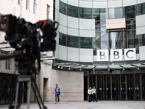 Security guards patrol outside BBC Broadcasting House in central London on July 9, 2023. 