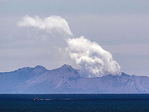 Steam rises from the White Island volcano two days after a volcanic eruption off the coast of Whakatane on December 11, 2019. 