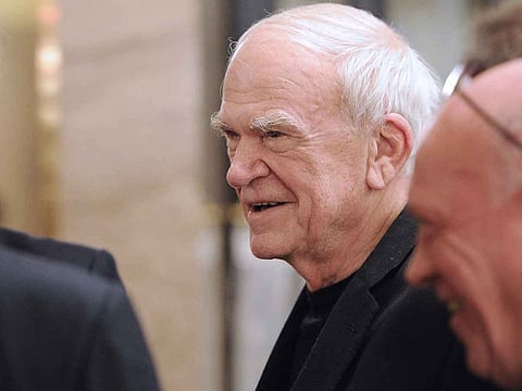 Czech-born writer Milan Kundera (centre) attends the 20th anniversary party of the French philosopher Bernard-Henri Levy's review "La regle du jeu" (The rules of the game) in Paris on November 30, 2010. 