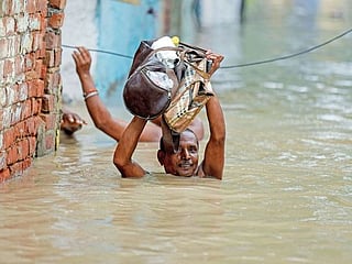 In pictures: Torrential monsoon rains flood New Delhi