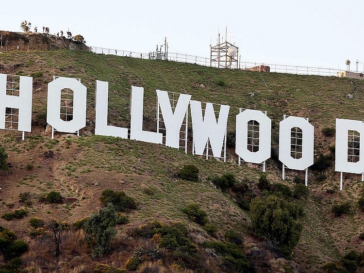 Hollywood sign stands as the WGA (Writers Guild of America) strike continues on July 12, 2023 in Los Angeles, California. Members of SAG-AFTRA, which represents actors and other media professionals, may go on strike by 11:59 p.m. today which could shut down Hollywood productions completely with the writers in the third month of their strike against Hollywood studios.