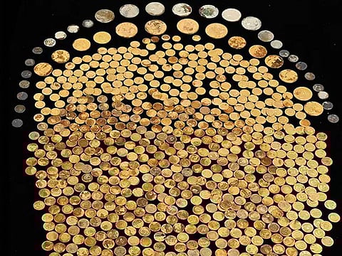 This undated image shows a collection of US Gold Dollars in Type I, Type II, and Type III, with the date range of 1854-1862; $10 Liberty’s with a date range of 1840-1862; $20 Libertys dated between 1857 and 1862; and 1863-P $20 Gold Liberty coins. 
