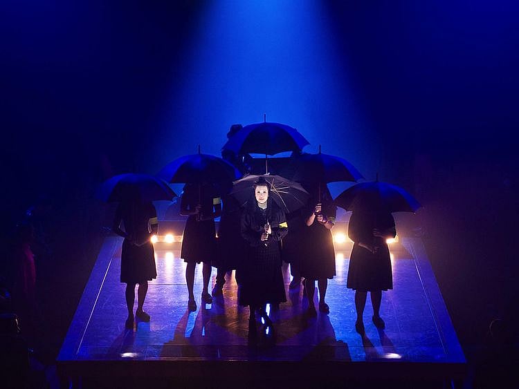 This image released by Boneau/Bryan-Brown shows Lea Salonga as Aurora Aquino, center, during a performance of "Here Lies Love," opening July 20 at the Broadway Theatre in New York.