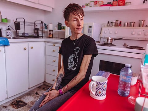 Lisa Pauli, 47, who says she wants to apply for medical assistance in dying (MAiD) when she is eligible because of her severe anorexia, sits on a chair, in Toronto, Ontario, Canada June 9, 2023.