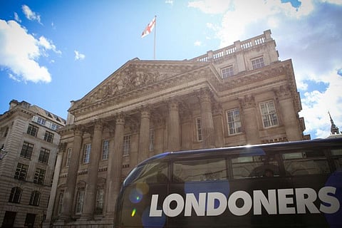 A bus passes through London's financial district, as Britain struggles with the highest inflation rate among the world's big rich economies, in London, Britain July 17, 2023. REUTERS/Rachel Adams