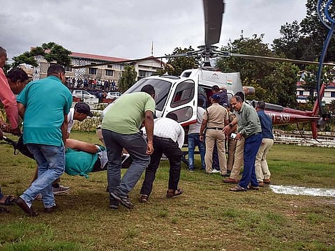 A person being airlifted to AIIMS Rishikesh after he was injured due to electrocution at the under-construction Namami Gange project on the banks of the Alaknanda River, in Chamoli on Wednesday, July 19, 2023. 
