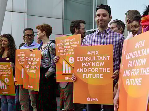 Senior doctors strike on a picket line outside University College Hospital in London, on July 20, 2023.  