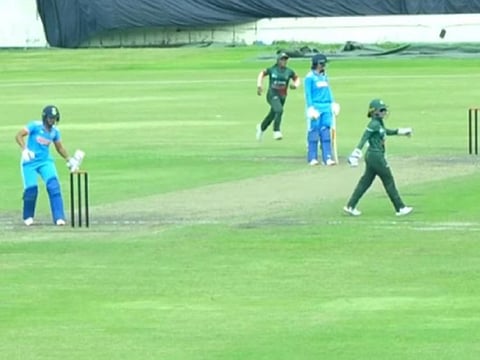 Harmanpreet Kaur smashes the stumps after being given out for 14 during the chase in the third One-dayer in Dhaka.