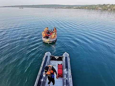 This handout photo from Indonesia's National Rescue Agency (Basarnas) taken and released on July 24, 2023 shows members of a rescue team setting out to conduct search and rescue operations in Buton Tengah, southwest Sulawesi after a ferry sank. 