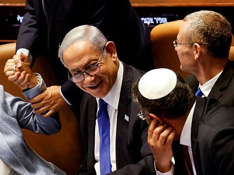 Israeli Prime Minister Benjamin Netanyahu and lawmakers gather at the Knesset plenum to vote on a bill that would limit some Supreme Court power, in Jerusalem July 24, 2023.  