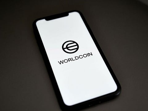 The Worldcoin logo on a smartphone arranged in Germantown, New York.