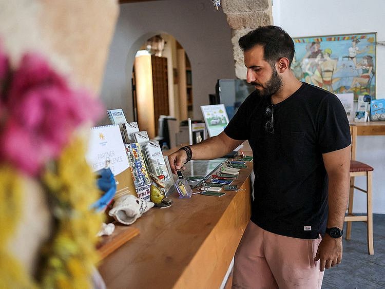 2023-07-25T173418Z_238149434_RC2CA2ADA98N_RTRMADP_3_EUROPE-WEATHER-GREECE-WILDFIRE-LIVELIHOODS-(Read-Only)