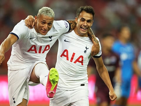 Tottenham Hotspur's Richarlison celebrates scoring their second goal with Sergio Reguilon during their friendly against Lion City Sailors FC at the National Stadium, Kallang, Singapore, on Wednesday.