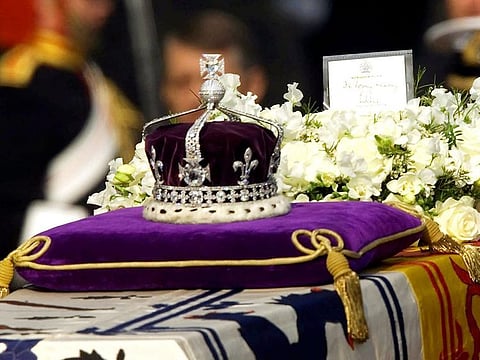 The Koh-i-Noor diamond, set in the Maltese Cross at the front of the Queen Mother's crown, on her coffin in Westminster Hall. 
