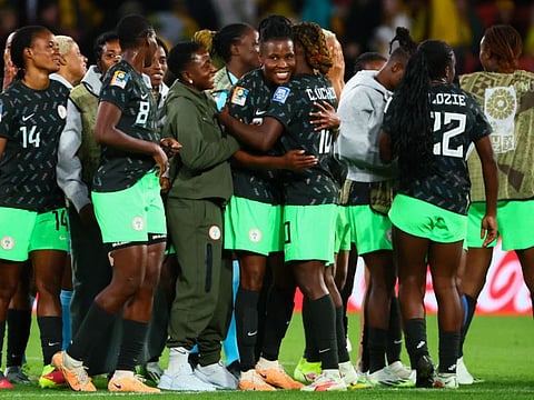 Nigeria players celebrate their victory over Australia in Women's World Cup Group B match at Brisbane Stadium in Brisbane on Thursday.