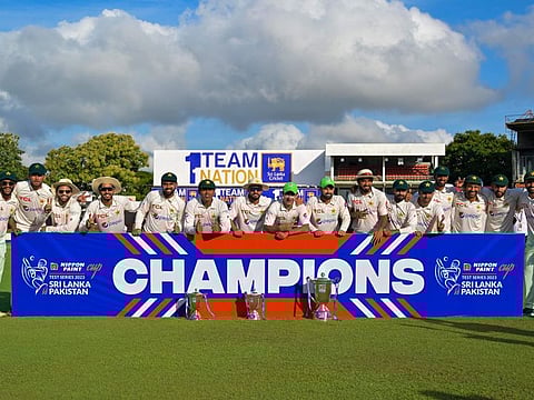 Pakistan's players with the trophy after their second Test win over Sri Lanka at the Sinhalese Sports Club Ground in Colombo on Thursday.