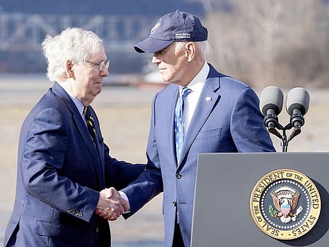 File photo: US President Joe Biden shakes hands with US Senate Republican Leader Mitch McConnell. 