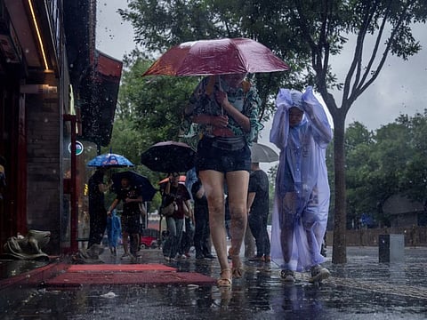 A tourist area during heavy rain in Beijing on July 30, 2023.  