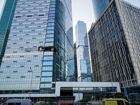 A view shows the damaged facade of an office building in the Moscow City following a reported Ukrainian drone attack in Moscow, on July 30, 2023.  