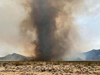 Photos: Crews are battling 'fire whirls' in California's Mojave Desert
