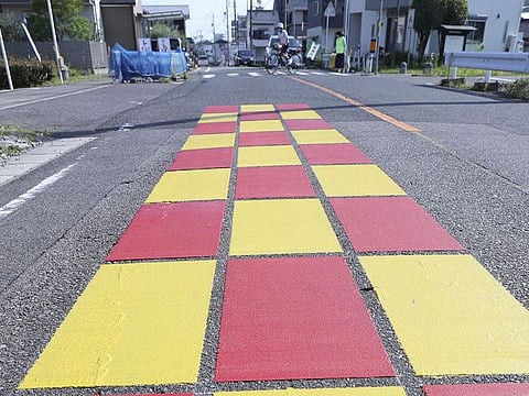 The checkered pattern was painted in late June as part of a social experiment.