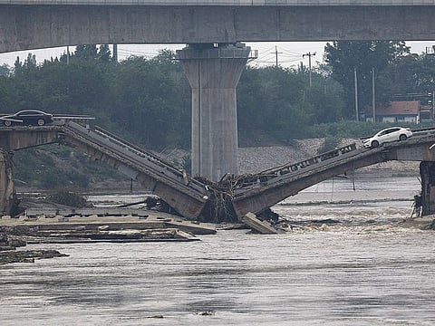 A bridge is damaged after remnants of Typhoon Doksuri brought rains and floods in Beijing, China August 2, 2023. 