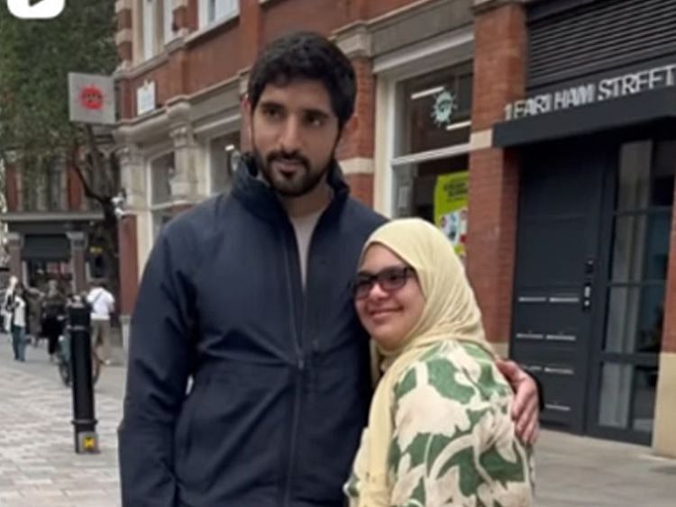 faz3 sheikh hamdan with woman who has down syndrome