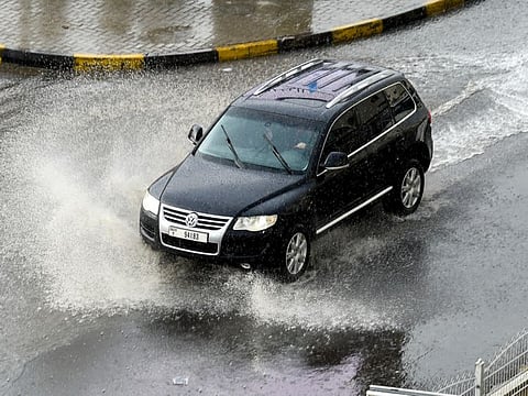 Motorists brave the rain at Khalidiya street in Sharjah. Photo: Virendra Saklani/Gulf News