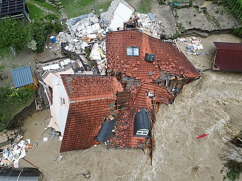 A view of a damaged building in a flooded area, following heavy rains, in Prevalje, Slovenia August 6, 2023.  