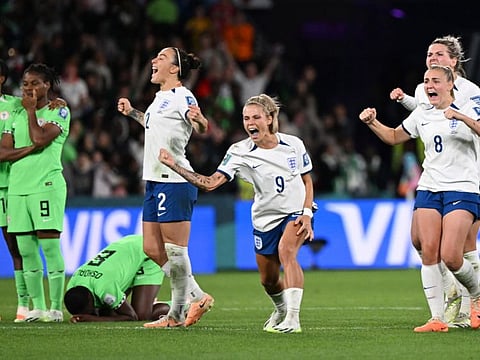 England's Lucy Bronze, Rachel Daly and Georgia Stanway celebrate during the penalty shootout against Nigeria at the Brisbane Football Stadium on Monday.