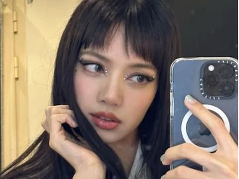 This year is a wave of new K-trends, including the Futuristic look. Like Lisa from Blackpink, you can try out some different glitter for your eyes, sparkly eyeshadow, and bright colours for your lips. 