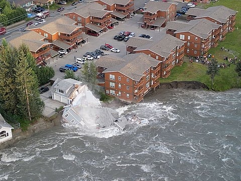 Dramatic video shows house collapse into flooded Alaska river A drone view shows a house collapsing into a river due to glacial floods in Juneau, Alaska, US August 5, 2023, in this screengrab obtained from a video on social media.
