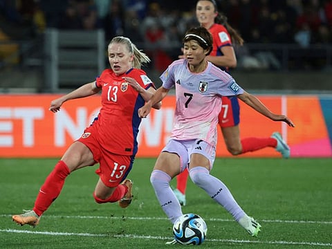 Japan's midfielder Hinata Miyazawa (rigt) battles past Norway's midfielder Thea Bjelde during the Women's World Cup round of 16 match at Wellington Regional Stadium on August 5.