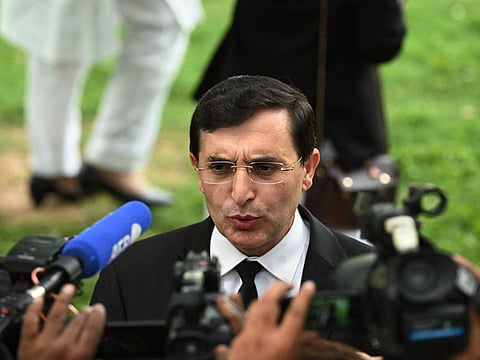 Gohar Khan, lawyer and legal team member of former Pakistans Prime Minister Imran Khan, talks to the media as he arrives to attend a hearing at the High Court in Islamabad on August 9, 2023.  