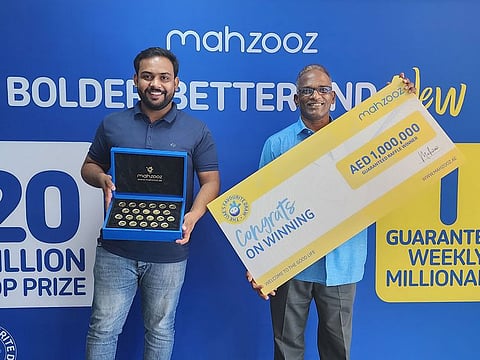 An Indian expat Venkata (R) and Muahmmed from Pakistan are the latest winners of Mahzooz draw in Dubai