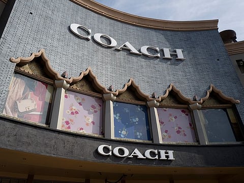 Tapestry, parent company of luxury handbag and accessories retailer Coach, is buying the owner of fashion brands including Michael Kors, Versace and Jimmy Choo, Capri Holdings. 